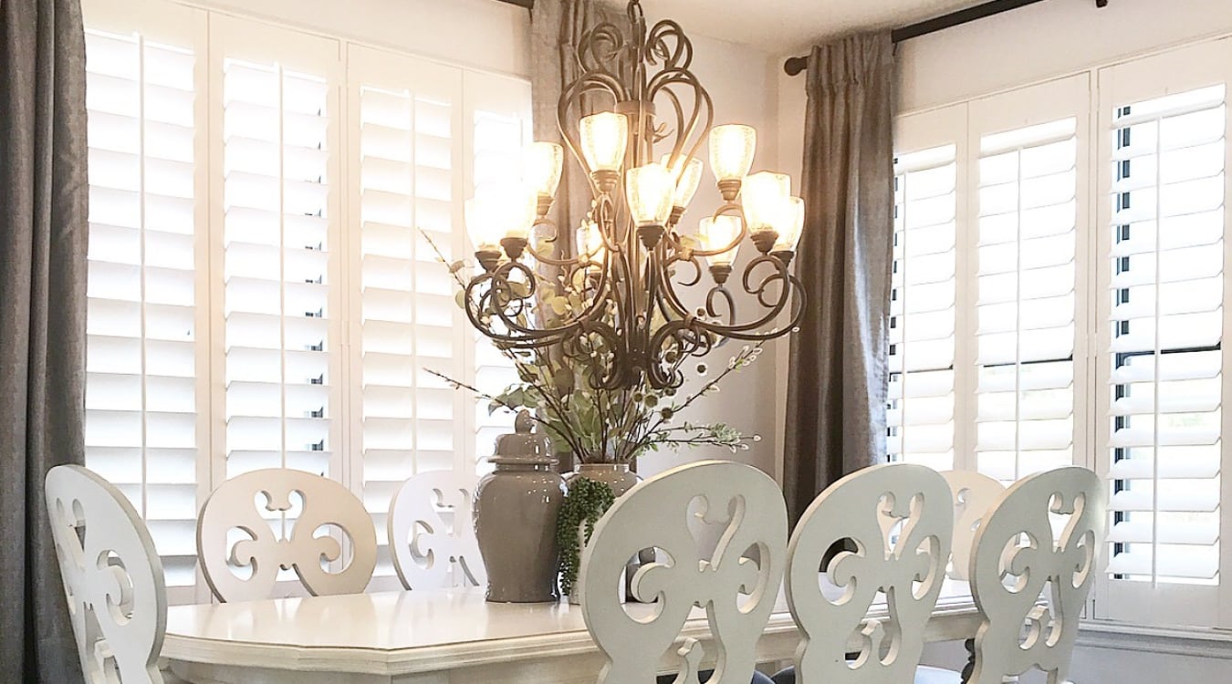 dining room with white interior shutters